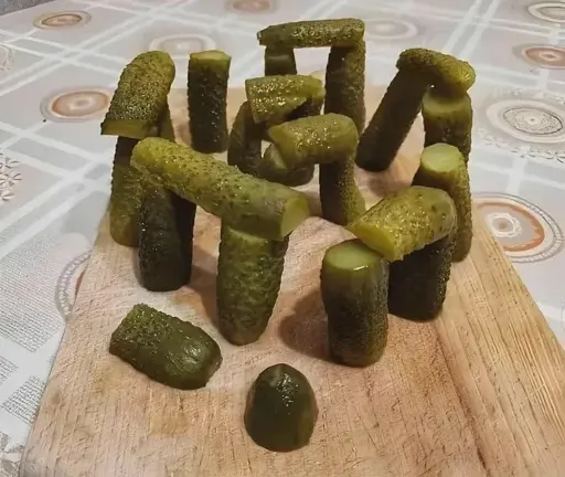 Picture of a model of Stonehenge built from pickles