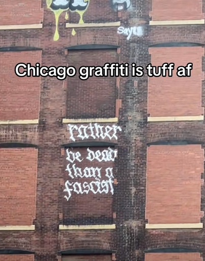 Photo of a brick wall with graffiti “rather be dead than a fascist” showing the caption “Chicago graffiti is tuff af”